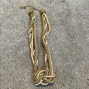 Elegant Gold and Silver Knot Necklace